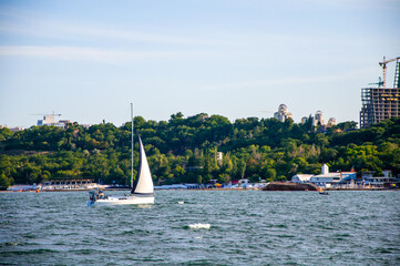 Obraz premium White sail on the sea. Sailing. Sailing competitions.