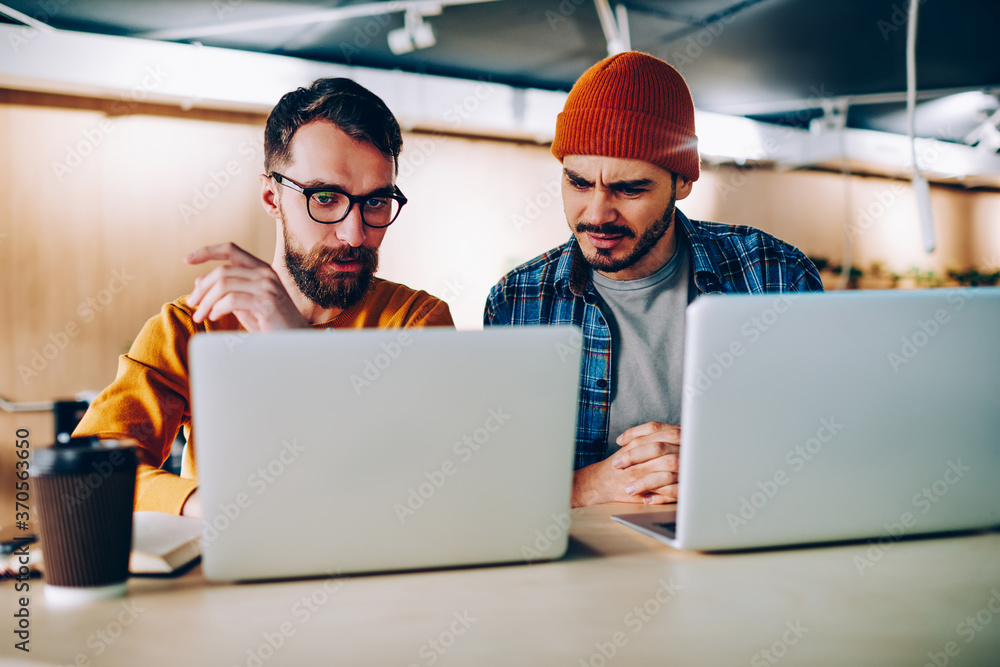 Poster puzzled hipster guys installing new application for chatting online having problem with internet con