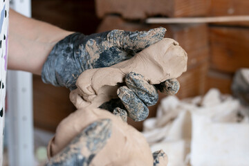 knead clay, use clay for the product, close-up