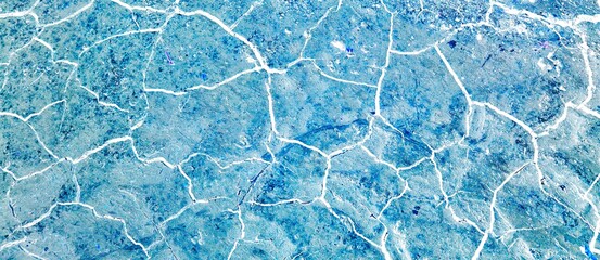 Background blue surface marble texture with veins close-up