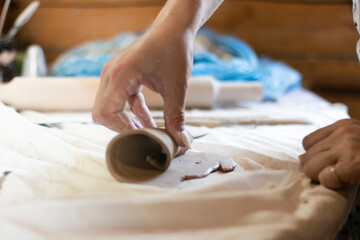 working with clay, twisting clay, art, close-up