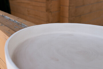 Fototapeta na wymiar work of a ceramist, clay tray