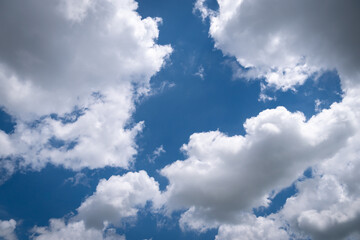 Obraz premium The blue sky with moving white clouds. The most of clouds are beautiful color and shade, suitable for use as background image.