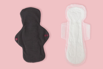 female personal hygiene products isolated on a pink background reusable pads as a choice eco-friendly zero waste reusable product for a period of time. Selective focus