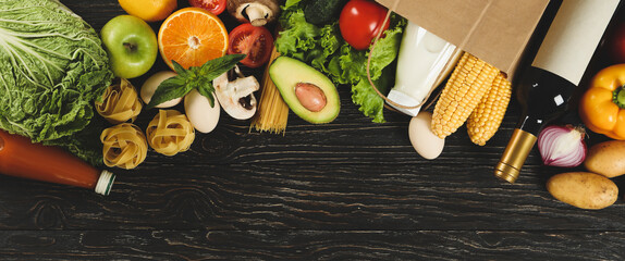 Different food on wooden background, space for text