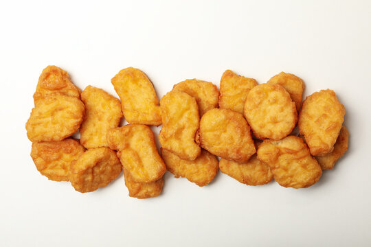 Fried chicken nuggets on white background, top view