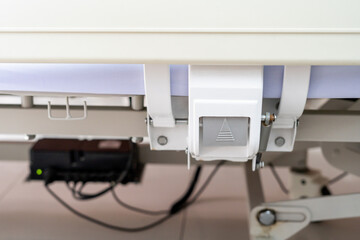 Hospital bed gray push button Press the time to raise the patient's bed higher.