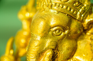 A golden headed elephant statue in a temple, Thailand.