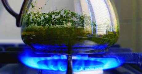 Tea brewing using blue gas flame