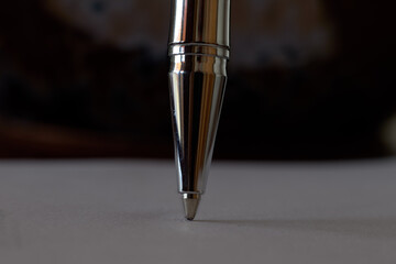 Close-up of a metal ballpoint pen