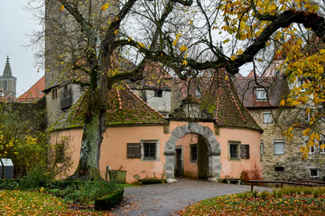 View on medieval castle gate from park Burggarten in old town Rothenburg ob der Tauber, Bavaria,...