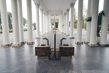Mineral healing spring flows at the colonnade in Marianske Lazne. It is a spa town in western...