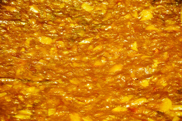 Yellow ripe mango, grind thoroughly, then simmer until thickened, let to dry in the sun.