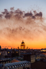 Fototapeta premium Sunset cityscape of Saint Petersburg with smoke after fireworks