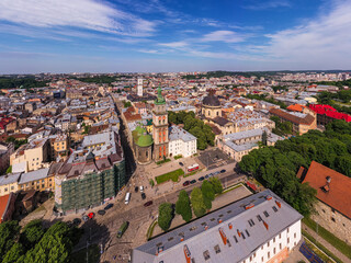 Fototapeta na wymiar Panoramic aerial view of colourful houses in historical old district of Lviv, Ukraine. Lviv is one of main cultural centres and largest city and in western Ukraine.