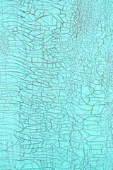 blue and turquoise old Board with cracks from old paint, vintage grunge style with cracked surface background for your text, decoration or advertising template, retro art