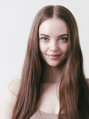 Naklejka premium Smooth hairstyle girl beautiful skin care portrait