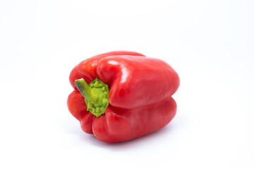 The red bell pepper isolated on a white