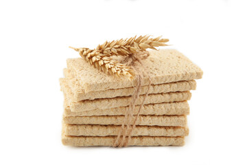 Wheat round crispbread, crunchy multigrain cereal seeds isolated on white background, healthy eating