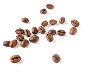 Naklejka premium Roasted coffee beans on wooden texture background.