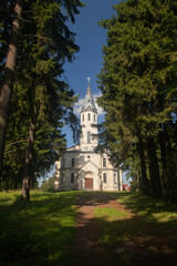 Fototapeta na wymiar Old Lutheran village church in the forest