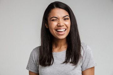 Portrait of a happy smiling young african woman