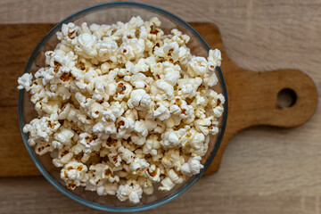 Popcorn in a glass bowl.