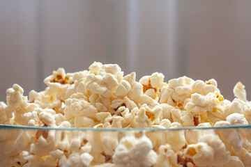 Popcorn in a glass bowl.