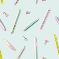 Creative seamless pattern with office supplies, color pencils, pens, puler, markers and metal paper clips. Back to school background.