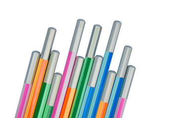 Back side of some different colored wood pencil crayons on white background