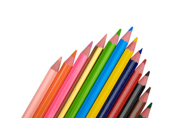 Beautiful arrow pattern made with some different wood pencil crayons on white background