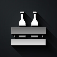 Silver Pack of beer bottles icon isolated on black background. Wooden box and beer bottles. Case crate beer box sign. Long shadow style. Vector Illustration.
