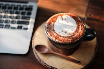 Cup of hot chocolate on wooden