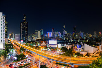 Fototapeta na wymiar Night Cityscape of Bangkok Thailand. In which Bangkok Is the administrative center for education, transportation Finance, banking, commerce, communication, and the prosperity of the country.