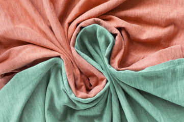 The folds of the fabric. Orange and green.