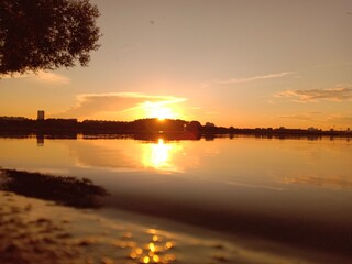 Obraz premium sunset on the lake, water and sky