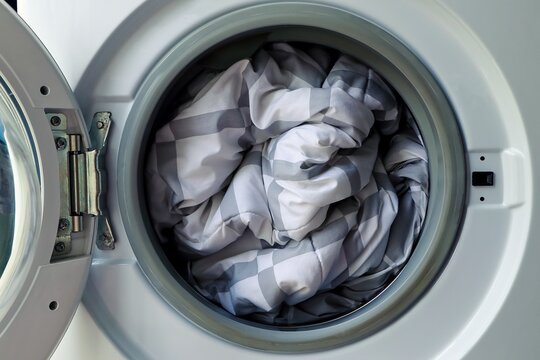 Duvet inside washing machine, Cleaning blanket.