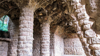 Naklejka premium Walking alley in Park Guell in Barcelona