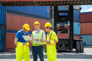 Foreman team meeting and working at cargo freight logistic warehouse for import export,Teamwork concept.