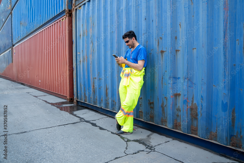 Poster container workers resting at the container area