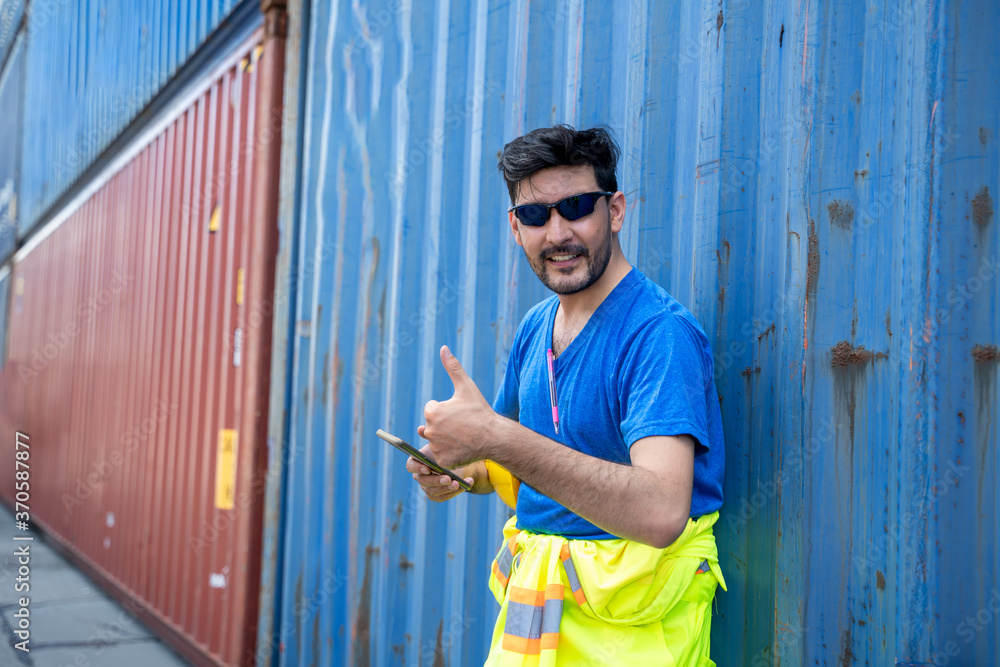 Poster container workers resting at the container area