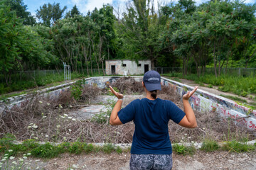 Life Gurad reacts to an abandoned overgrown pool full of debris