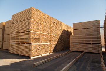 Big pile of boards on storehouse