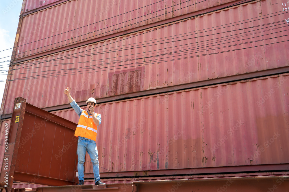 Poster container worker loading containers box for import export at industrial container cargo.