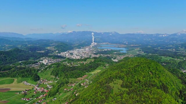 Lake Velenje and TES Power Station. Scenic aerial forward