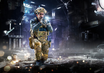Army soldier in Protective Combat Uniform holding Special Operations Forces Combat Assault Rifle on...