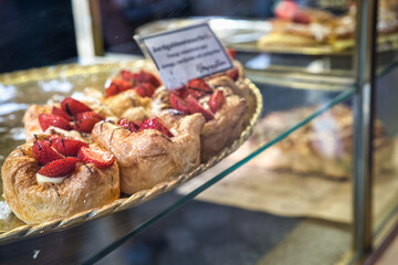 Strawberry baked cake in show window