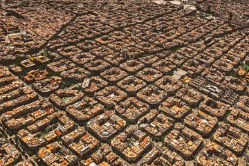 Fototapete Rund Aerial view of typical buildings of Barcelona cityscape from helicopter. top view, Eixample residencial famous urban grid © ikuday
