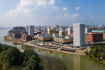 modern residential complex in a large city on the river bank. view from the plane