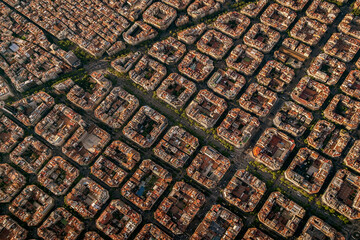 Aerial view of typical buildings of Barcelona cityscape from helicopter. top view, Eixample...
